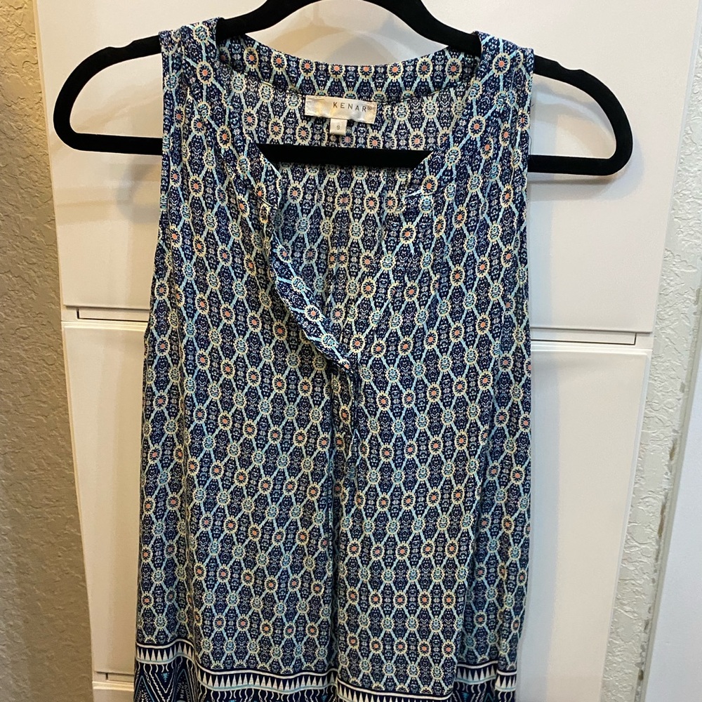 Beautiful blouse,  feels so soft. Size Small